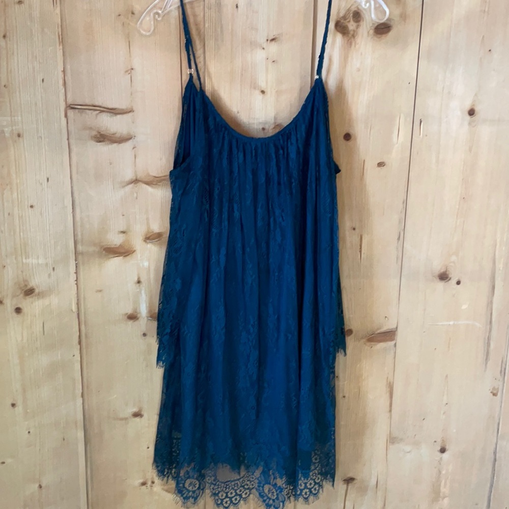 Mini dress with lace overlay and cold shoulder